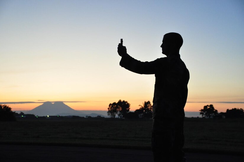 ILOPANGO, El Salvador – Air Force Tech. Sgt. Bill Bayer, a weather meteorologist assigned to Joint Task Force-Bravo, performs early morning weather checks measuring winds, temperature, dew point and pressure with a handheld Kestrel Nov. 14. Sergeant Bayer has been a vital piece to providing daily weather reports for the 1st Battalion, 228th Regiment during a deployment to El Salvador in order to help them stabilize the region from a recent mudslide. Since Nov. 11 JTF-Bravo has distributed more than 172,700 pounds of supplies (U.S. Air Force photo/Staff Sgt. Chad Thompson).