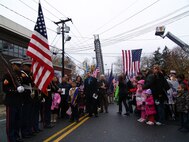 Family, friends, and members of the community gathered to honor Sgt. Julian Arechaga by renaming the street he grew up on in Hempstead, N.Y., Nov. 14. Arechaga was killed during combat operations in Al Anbar, Iraq Oct. 9, 2006.