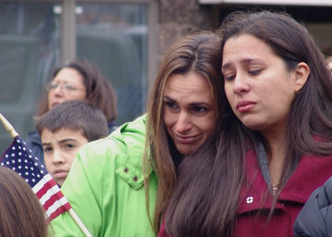 Family, friends, and members of the community gathered to honor Sgt. Julian Arechaga by renaming the street he grew up on in Hempstead, N.Y., Nov. 14. Arechaga was killed during combat operations in Al Anbar, Iraq Oct. 9,::r::::n::2006.