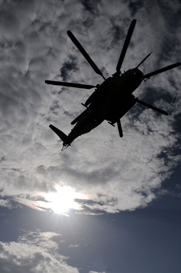 A CH-53E Super Stallion helicopter from Marine Heavy Helicopter Squadron (HMH) 461 flies overhead in route to dropping off Dominican airmen who minutes later poured out of the helicopter to practice a heliborne airfield assault.  USS Wasp (LHD 1) is currently deployed on Southern Partnership Station-Amphib with Destroyer Squadron 40 and embarked Security Cooperation Marine Air-Ground Task Force. Southern Partnership Station is part of the Partnership of the Americas Maritime Strategy that focuses on building interoperability and cooperation in the region to meet common challenges.