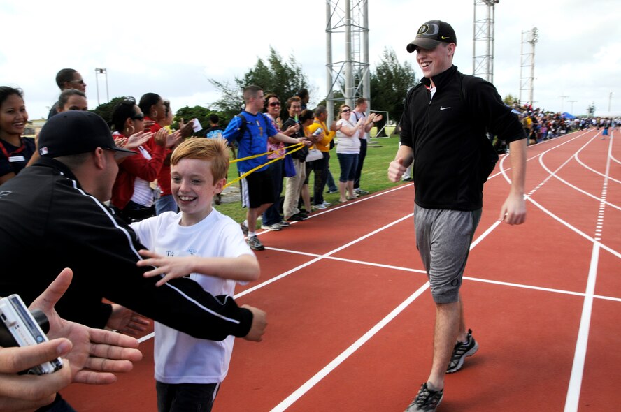 An American athlete participates in a 200 meter race at the Kadena Special Olympics, held Nov. 14 at Kadena Air Base, Japan. (U.S. Air Force photo/Tech. Sgt. Angelique Perez) 
