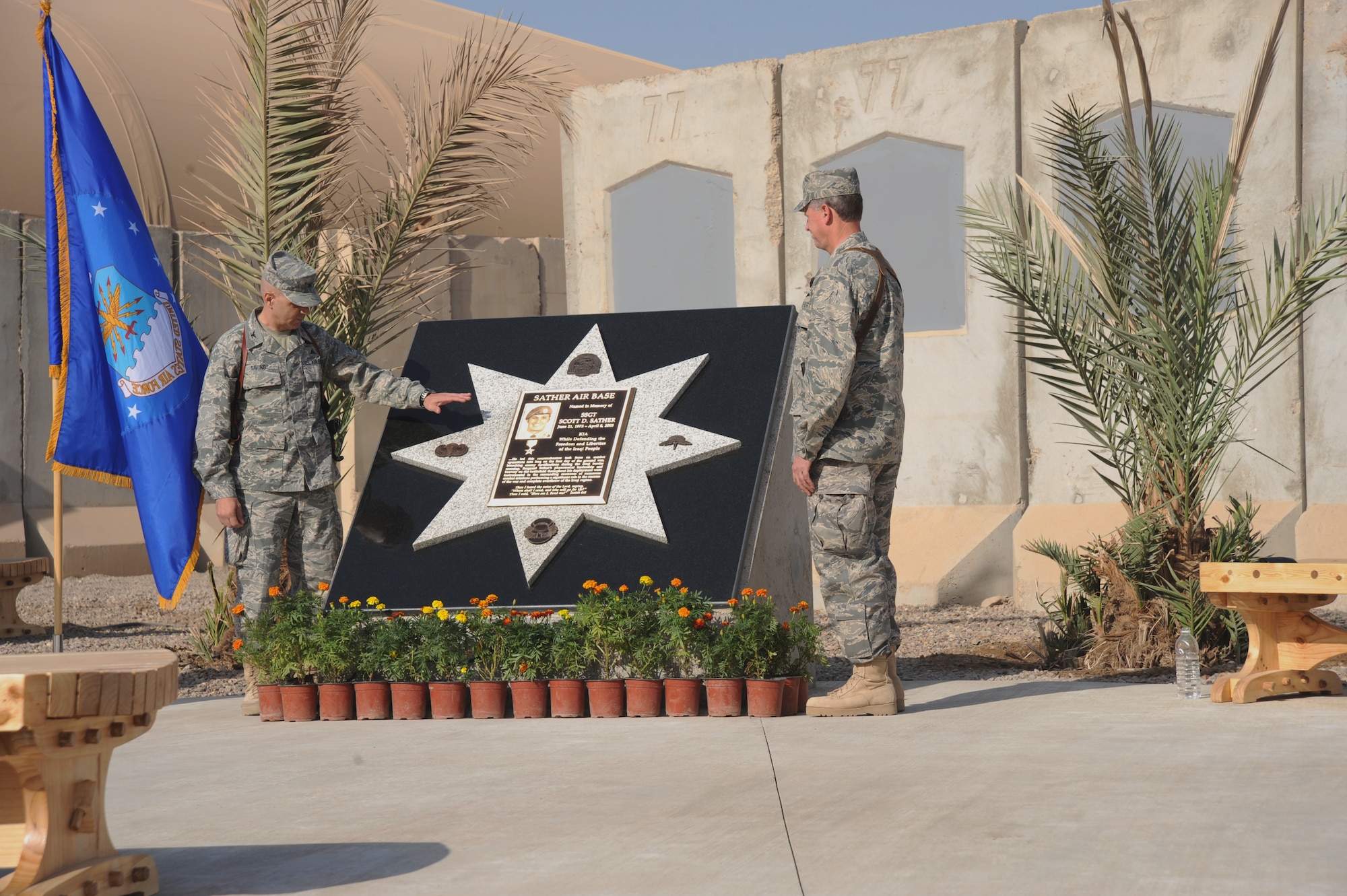 SATHER AIR BASE, Iraq - Col. Vincent Savino, 368th Expeditionary Air Support Operations Group commander, left, and Col. Michael F. Canders, 447th Air Expeditionary Group commander, view the new Staff Sgt. Scott D. Sather Memorial Nov.11, 2009.  The base is named after  Sergeant Sather, a combat controller with the 24th Special Tactics Squadron from Pope Air Force Base, N.C., who was killed in action on April 8, 2003.  (U.S. Air Force photo / Staff Sgt. Misty D. Slater)