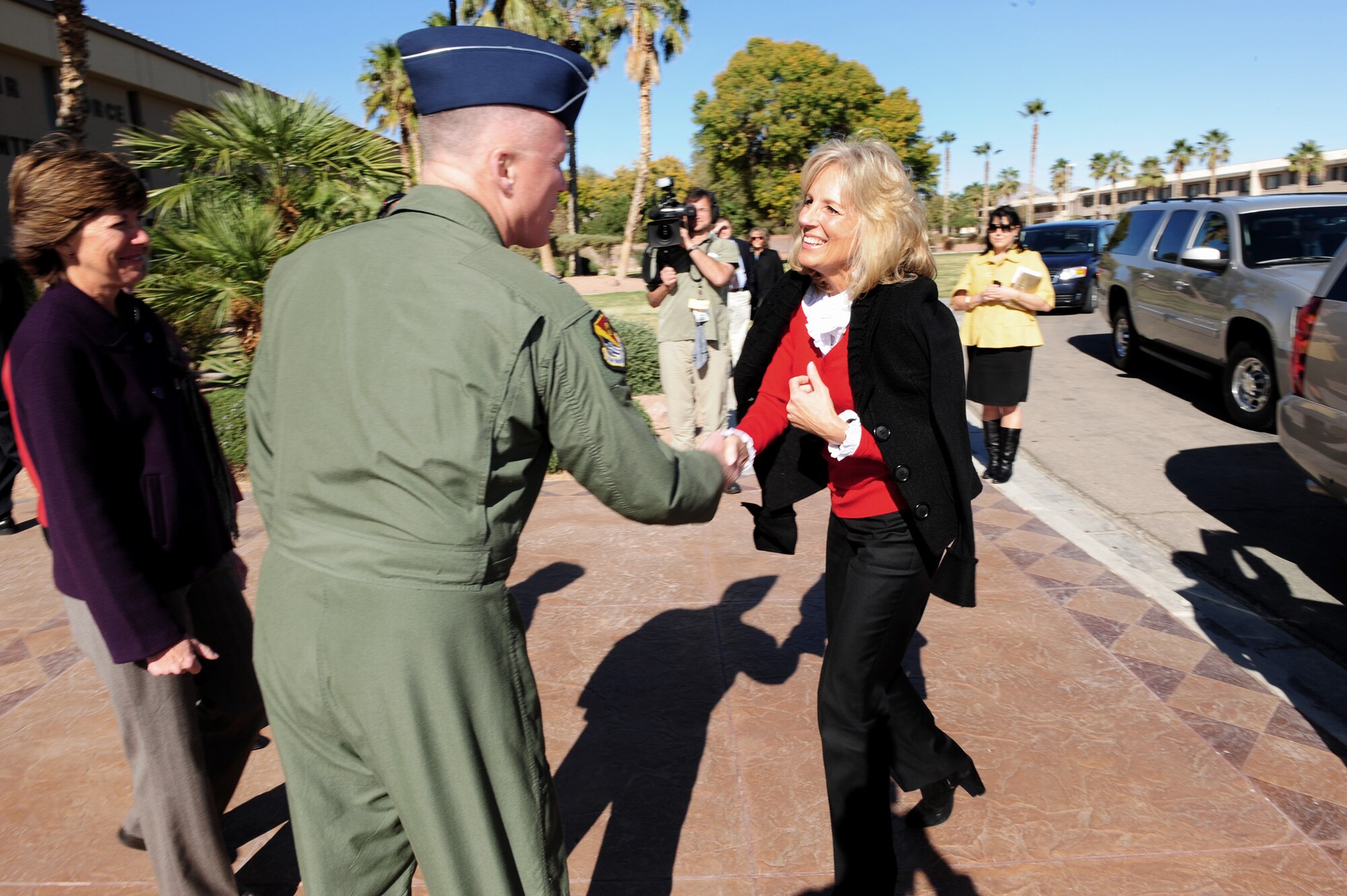 NELLIS AIR FORCE BASE, Nev.-- Brig. Gen. James McLaughlin, U.S. Air Force Warfare Center vice commander, along with Lorie Kresge, wife of Maj. Gen. Ted Kresge, USAFWC commander, greet Dr. Jill Biden, wife of vice presedent Joe Biden, during her visit to Nellis Nov. 15.  Dr. Biden has traveled to several bases in both the United States and Germany to speak with servicemembers and their families to show appreciation and raise awareness and for the special sacrifices that these Americans make.
(U.S. Air Force photo by Staff Sgt. William P. Coleman)
