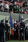 EAST RUTHERFORD, N.J. -- A joint-service color guard prepares for a pre-game ceremony at Giants Stadium, Nov. 15. Marine Corps, Air Force, Navy, Coast Guard and Army service members participated in a tribute to veterans before the game. A Coast Guard detachment sang the National Anthem and were joined by a joint-service color guard before the New York Jets game against the Jacksonville Jaguars. Chief Master Sgt. James A. Roy, Chief Master Sergeant of the Air Force, presented the coin for the pre-game coin toss.(Official Marine Corps photo by Sgt. Randall A. Clinton)