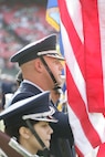 EAST RUTHERFORD, N.J. -- A joint-service color guard prepares for a pre-game ceremony at Giants Stadium, Nov. 15. Marine Corps, Air Force, Navy, Coast Guard and Army service members participated in a tribute to veterans before the game. A Coast Guard detachment sang the National Anthem and were joined by a joint-service color guard before the New York Jets game against the Jacksonville Jaguars. Chief Master Sgt. James A. Roy, Chief Master Sergeant of the Air Force, presented the coin for the pre-game coin toss.(Official Marine Corps photo by Sgt. Randall A. Clinton)