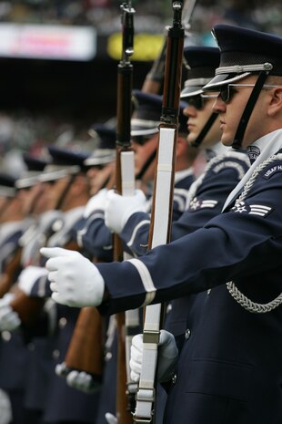 EAST RUTHERFORD, N.J. -- The Air Force Honor Guard Drill Team performs at halftime of the New York Jets vs Jacksonville Jaguars football game at Giants Stadium, Nov. 15. They are the traveling component of the USAF Honor Guard and inspires Air Force awareness among military and civilian audiences through its complex drill routine. In all they do, the Drill Team personifies the integrity, discipline, teamwork, and professionalism of every Airman and every Air Force mission. During the Air Force Honor Guard's 60-year history, the Drill Team has performed in every state of the union and many countries abroad(Official Marine Corps photo by Sgt. Randall A. Clinton)