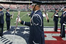 EAST RUTHERFORD, N.J. -- The Air Force Honor Guard Drill Team performs at halftime of the New York Jets vs Jacksonville Jaguars football game at Giants Stadium, Nov. 15. They are the traveling component of the USAF Honor Guard and inspires Air Force awareness among military and civilian audiences through its complex drill routine. In all they do, the Drill Team personifies the integrity, discipline, teamwork, and professionalism of every Airman and every Air Force mission. During the Air Force Honor Guard's 60-year history, the Drill Team has performed in every state of the union and many countries abroad(Official Marine Corps photo by Sgt. Randall A. Clinton)