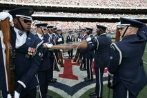 EAST RUTHERFORD, N.J. -- The Air Force Honor Guard Drill Team performs at halftime of the New York Jets vs Jacksonville Jaguars football game at Giants Stadium, Nov. 15. They are the traveling component of the USAF Honor Guard and inspires Air Force awareness among military and civilian audiences through its complex drill routine. In all they do, the Drill Team personifies the integrity, discipline, teamwork, and professionalism of every Airman and every Air Force mission. During the Air Force Honor Guard's 60-year history, the Drill Team has performed in every state of the union and many countries abroad(Official Marine Corps photo by Sgt. Randall A. Clinton)