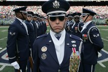 EAST RUTHERFORD, N.J. -- The Air Force Honor Guard Drill Team performs at halftime of the New York Jets vs Jacksonville Jaguars football game at Giants Stadium, Nov. 15. They are the traveling component of the USAF Honor Guard and inspires Air Force awareness among military and civilian audiences through its complex drill routine. In all they do, the Drill Team personifies the integrity, discipline, teamwork, and professionalism of every Airman and every Air Force mission. During the Air Force Honor Guard's 60-year history, the Drill Team has performed in every state of the union and many countries abroad(Official Marine Corps photo by Sgt. Randall A. Clinton)