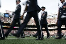 EAST RUTHERFORD, N.J. -- The Air Force Honor Guard Drill Team performs at halftime of the New York Jets vs Jacksonville Jaguars football game at Giants Stadium, Nov. 15. They are the traveling component of the USAF Honor Guard and inspires Air Force awareness among military and civilian audiences through its complex drill routine. In all they do, the Drill Team personifies the integrity, discipline, teamwork, and professionalism of every Airman and every Air Force mission. During the Air Force Honor Guard's 60-year history, the Drill Team has performed in every state of the union and many countries abroad(Official Marine Corps photo by Sgt. Randall A. Clinton)