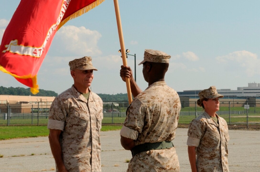 Marine Col. Gerard W. Fischer (left), 4th Civil Affairs Group commander, relinquished command to Col. Helen G. Pratt Aug. 7 on Anacostia Naval Station. Colonel Pratt previoulsy served as the assistant chief of staff G-4 at the 4th Marine Logistics Group.