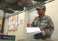 Airman Mims conducts an inventory of available food supplies in the stockroom of Duke Field's dining facility. (U.S. Air Force photo/Staff Sgt. Jon McCallum)