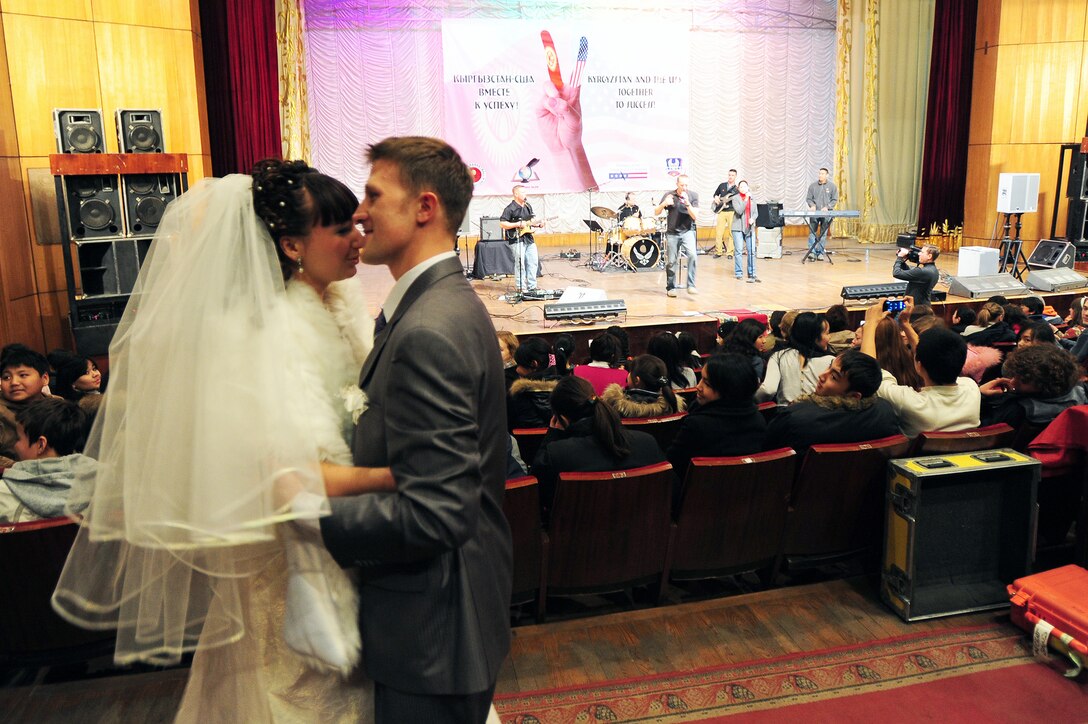 BISHKEK, Kyrgyzstan -- Newlyweds dance to the sounds of the U.S. Air Forces Central Sirocco Band during a performance at the Seitek Youth Center, Nov. 14, 2009. (U.S. Air Force photo/Senior Airman Steele C. G. Britton)
