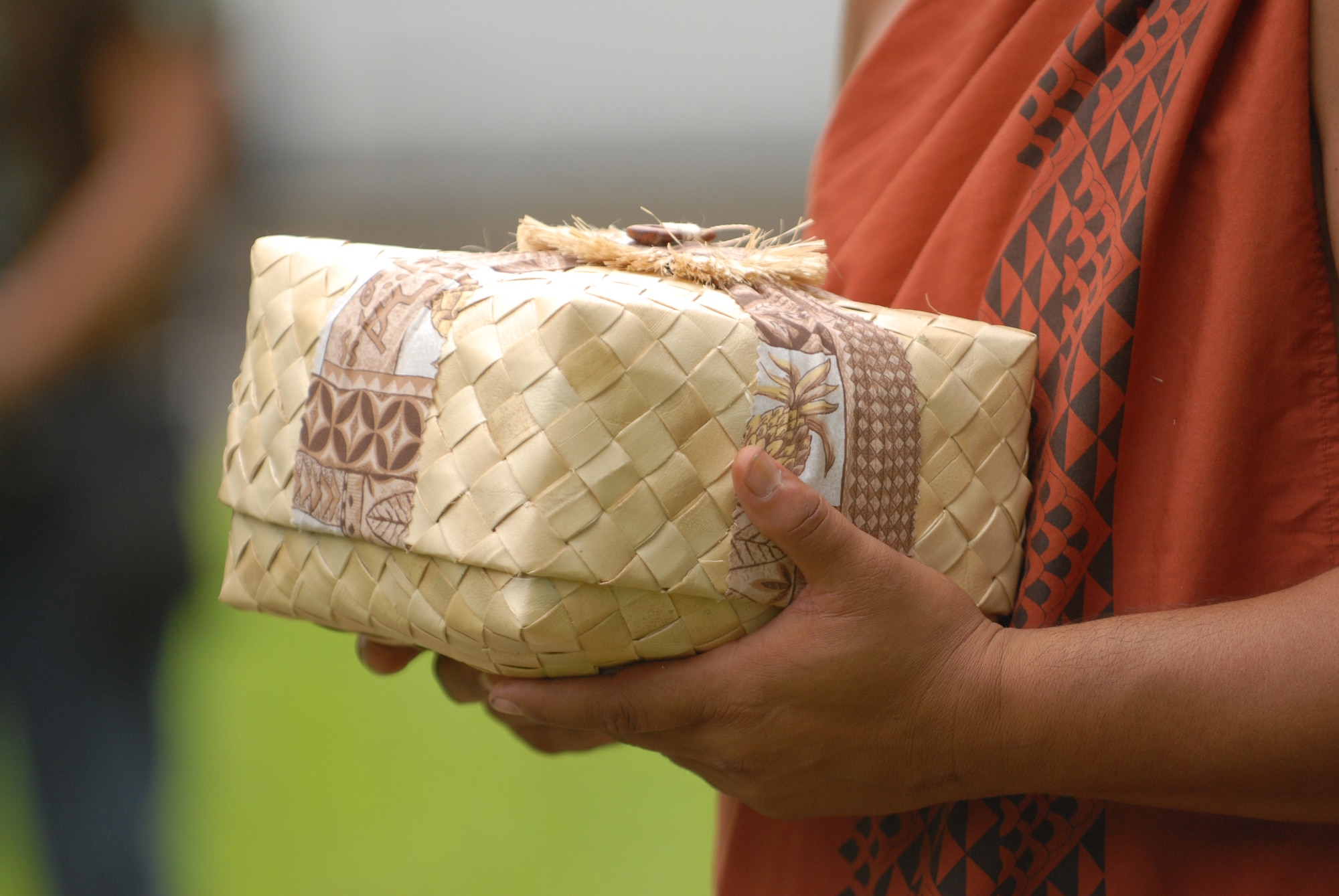 HICKAM AIR FORCE BASE, Hawaii -- Gifts are offered at the Haleamau Halealoha Burial after the Makahiki Festival here, Nov. 14. The gifts were set on the burial to respect and honor the ancestors of Hawaiians who came before them. (U.S. Air Force photo/Senior Airman Gustavo Gonzalez)