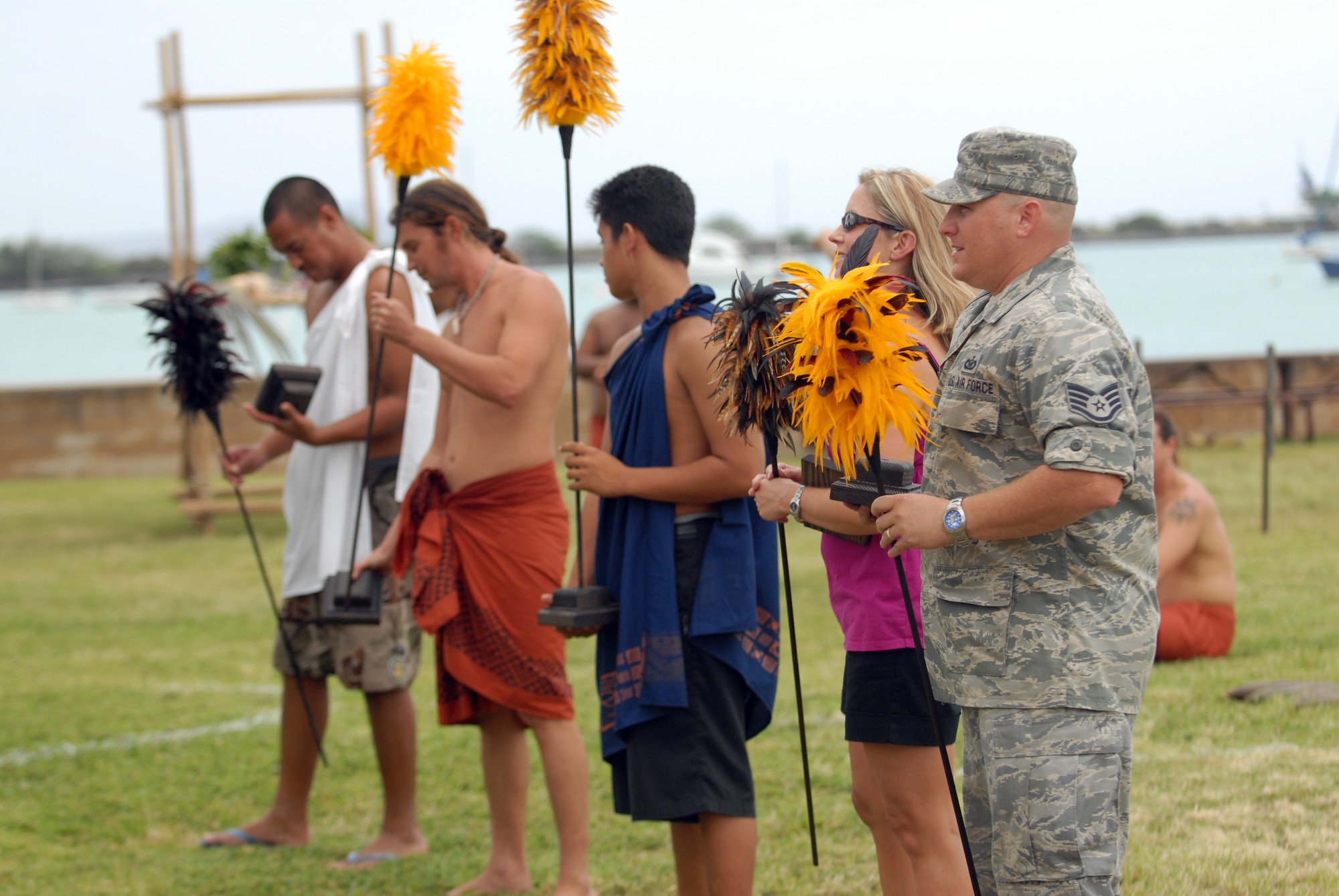 HICKAM AIR FORCE BASE, Hawaii -- Winners of each event recieved a kahili during the Makahiki Festival here, Nov. 14. For more than two-thousand years, the significance of Lono and his contributions to the beliefs and practices of the early Hawaiian people, influenced the celebration of events held during the Makahiki Festival throughout the Hawaiian Islands. Since Lono was the embodiment of all the characteristics of peace and welfare, all warfare was strictly forbidden during the time of the Makahiki. Since Lono represented the spiritual life-force that came out of all agricultural efforts, much feasting of every kind was done during the four months of the Makahiki. This focus on health and welfare made games of skill that tested a healthy body and mind a focal point of the Makahiki games. (U.S. Air Force photo/Senior Airman Gustavo Gonzalez)