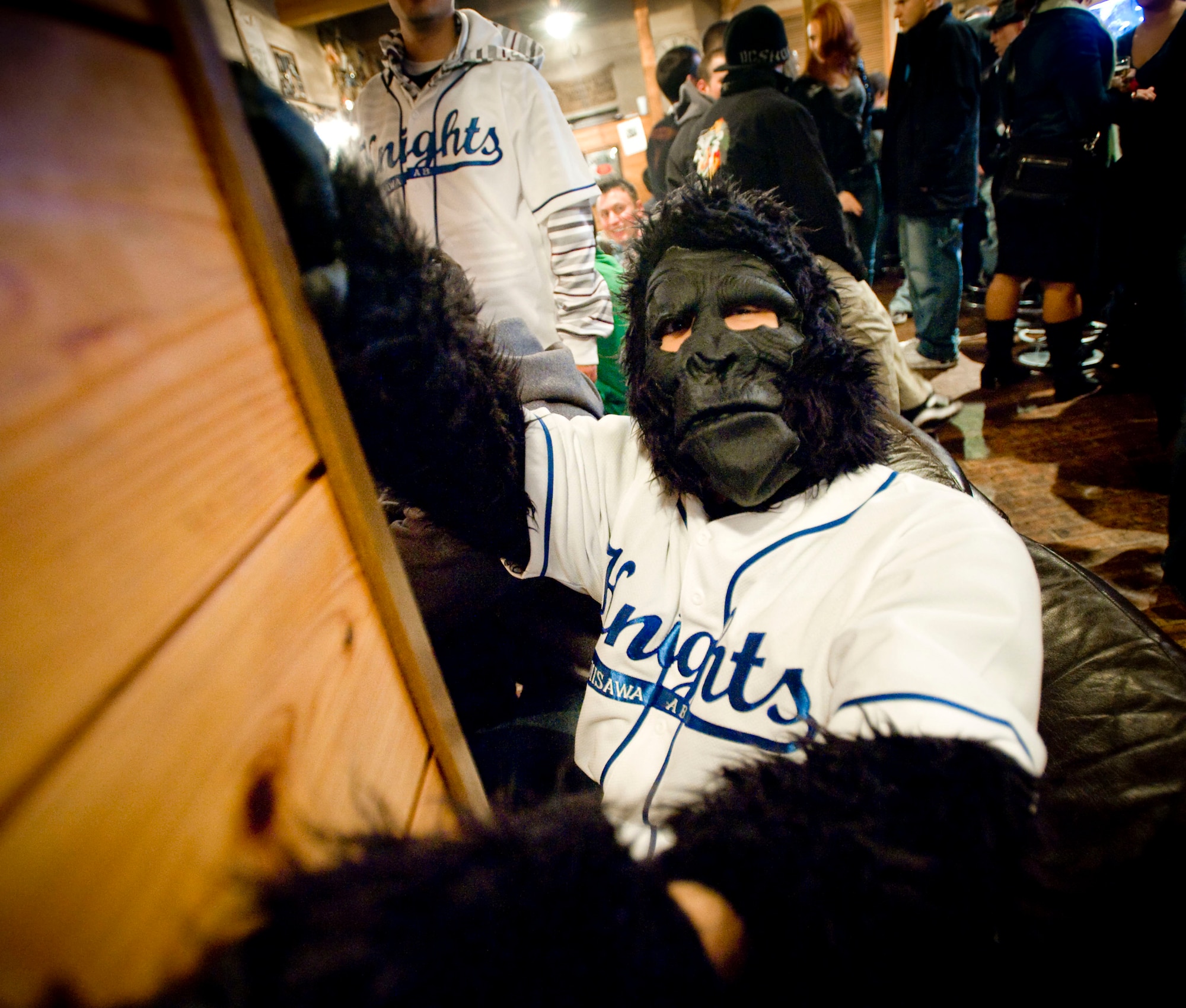 MISAWA AIR BASE, Japan -- A member of the Monkeys Against Drunk Driving hangs off the wall of a downtown Misawa bar Nov. 15. M.A.D.D. offers party-goers a free alternative to driving after having a drink. M.A.D.D. regularly sets up its tent in the Base Exchange parking lot and has given 675 people safe rides home since they started Aug. 8. (U.S. Air Force photo/Staff Sgt. Samuel Morse)