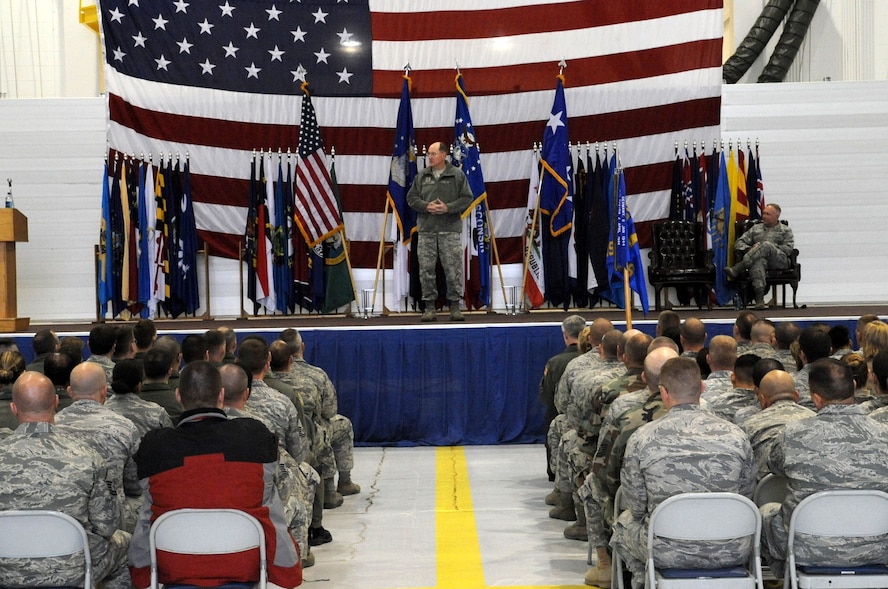 MINOT AIR FORCE BASE, N.D. -- Col. Ferdinand Stoss, 91st Missile Wing commander, presents a Theodore Roosevelt Plaque to Gen. Robert Kehler, Air Force Space Command commander, here Nov. 12. The general visited Minot AFB as an opportunity to wish the 91st MW a final farewell as the wing transfers to Global Strike Command Dec. 1.  (U.S. Air Force photo by Airman 1st Class Aaron-Forrest Wainwright)