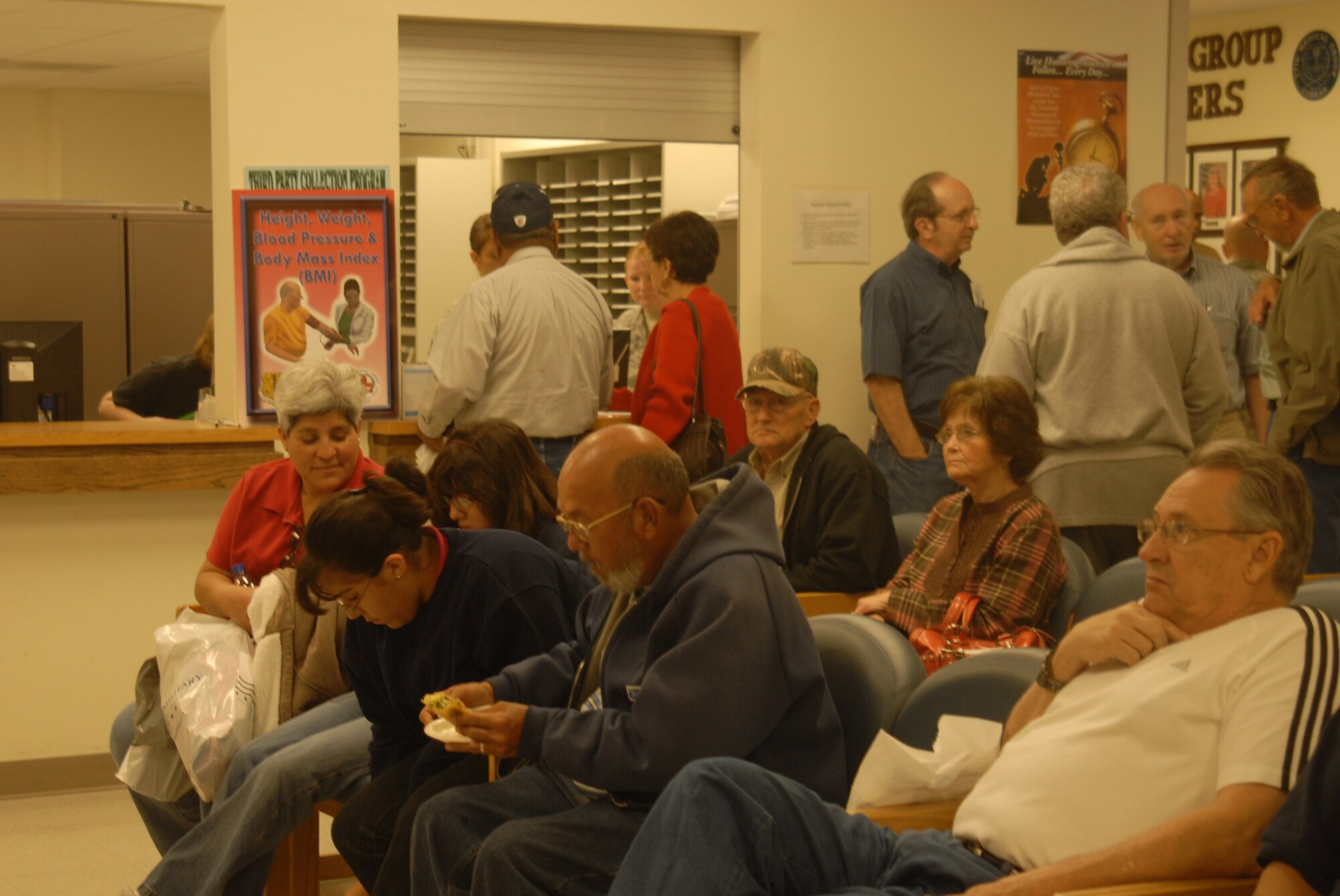 Retired military members wait their turn to see the doctor at the Goodfellow clinic during the Military Retirees Appreciation Day and Health Fair, Nov. 14. ( U.S. Air Force photo/Airman 1st Class Anne Gathua)