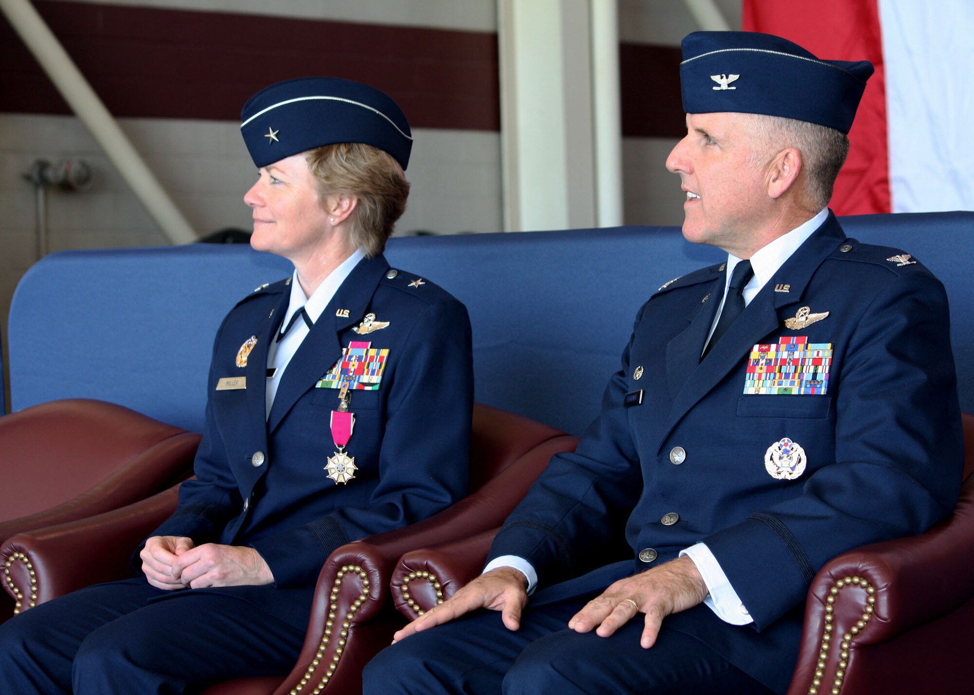 TRAVIS AIR FORCE BASE, Calif. -- Brig. Gen. Maryanne Miller and Col. John (Jay) C. Flournoy, Jr. listen to an address by Brig. Gen. Eric W. Crabtree, 4th Air Force commander at the 349th Air Mobility Wing change of command ceremony here Nov. 15, 2009. Colonel Flournoy assumed command of the Air Force Reserve Command’s largest associate wing from General Miller, who has been assigned to a position in the Pentagon. The ceremony was well attended by members of Team Travis and the local community. The change of command ceremony is a time-honored tradition which formally symbolizes the continuity of authority as the command is passed from one officer to another.  (U.S. Air Force photo / Staff Sgt. Meredith Mingledorff)
