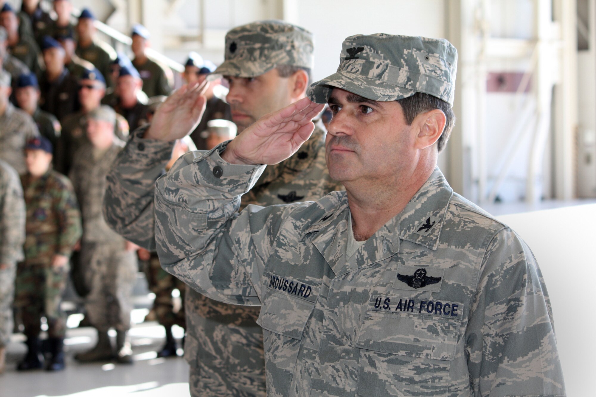 TRAVIS AIR FORCE BASE, Calif. -- Col. Barrett Broussard, 349th Air Mobility Wing vice commander (right), and Lt. Col. Karl E Goerke, 349th Operations Group Deputy Commander, salute during the wing change of command here Nov. 15, 2009. Col. John (Jay) C. Flournoy, Jr., assumed command of the Air Force Reserve Command’s largest associate wing from Brig. Gen. Maryanne Miller, who has been assigned to a position in the Pentagon. The ceremony was well attended by members of Team Travis and the local community. The change of command ceremony is a time-honored tradition which formally symbolizes the continuity of authority as the command is passed from one officer to another.  (U.S. Air Force photo / Staff Sgt. Meredith Mingledorff)