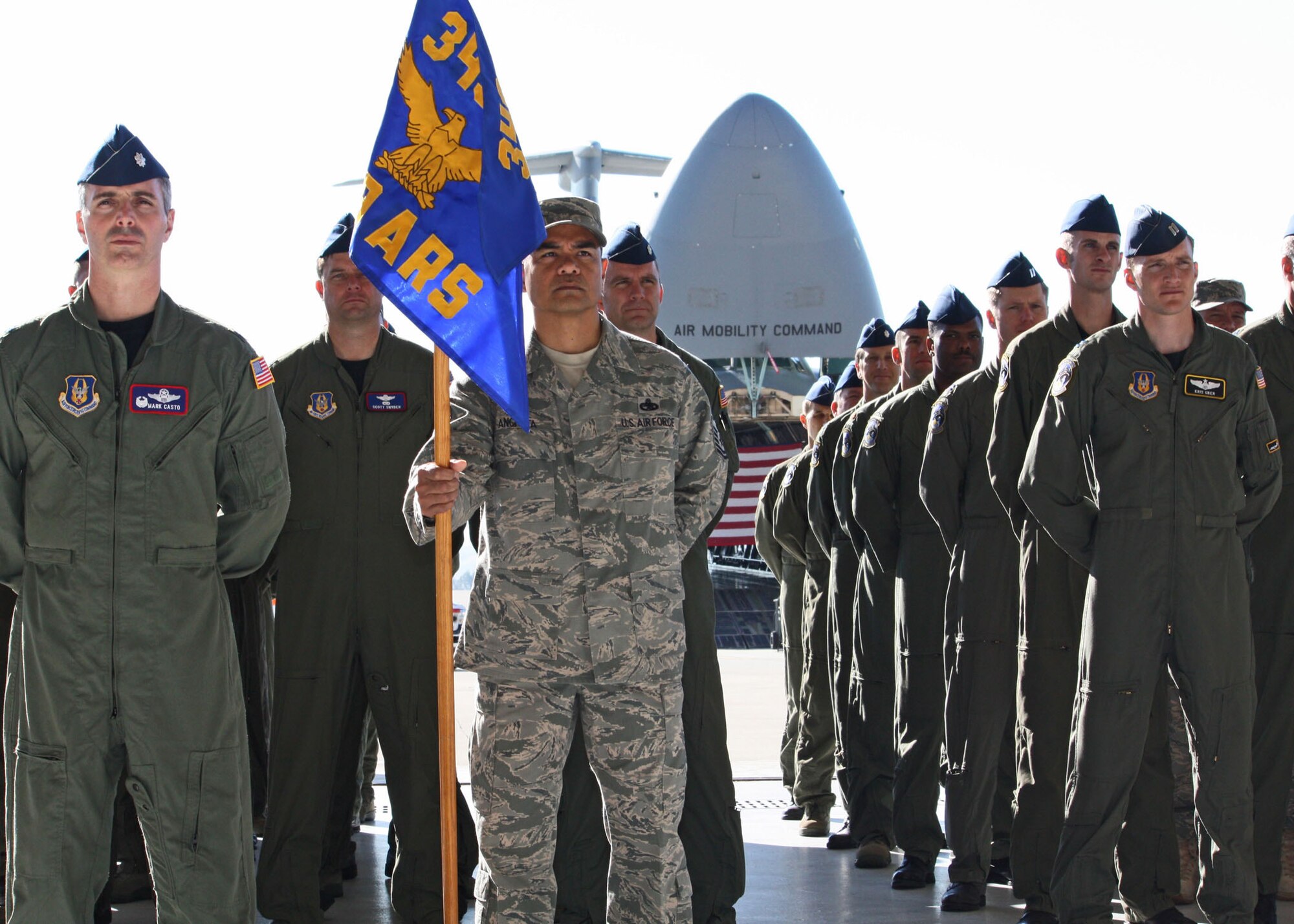 TRAVIS AIR FORCE BASE, Calif. -- Citizen Airmen from the 349th Operations Group stand at ease in formation during the 349th Air Mobility Wing change of command ceremony here Nov. 15, 2009. Col. John (Jay) C. Flournoy, Jr. assumed command of the Air Force Reserve Command’s largest associate wing from Brig. Gen. Maryanne Miller, who has been assigned to a position in the Pentagon. The ceremony was well attended by members of Team Travis and the local community. The change of command ceremony is a time-honored tradition which formally symbolizes the continuity of authority as the command is passed from one officer to another.  (U.S. Air Force photo / Staff Sgt. Meredith Mingledorff)