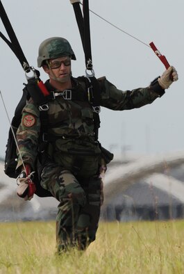 MOODY AIR FORCE BASE, Ga. -- Capt. Aaron Zamora, a combat rescue officer assigned to the 23rd Special Tactics Squadron at Hurlburt Field, Fla., lands after a free-fall jump during a training exercise here Oct. 29. Training jumps are conducted to increase free-fall proficiency and prepare members for deployment missions. (U.S. Air Force photo by Staff Sgt. Elizabeth Rissmiller)