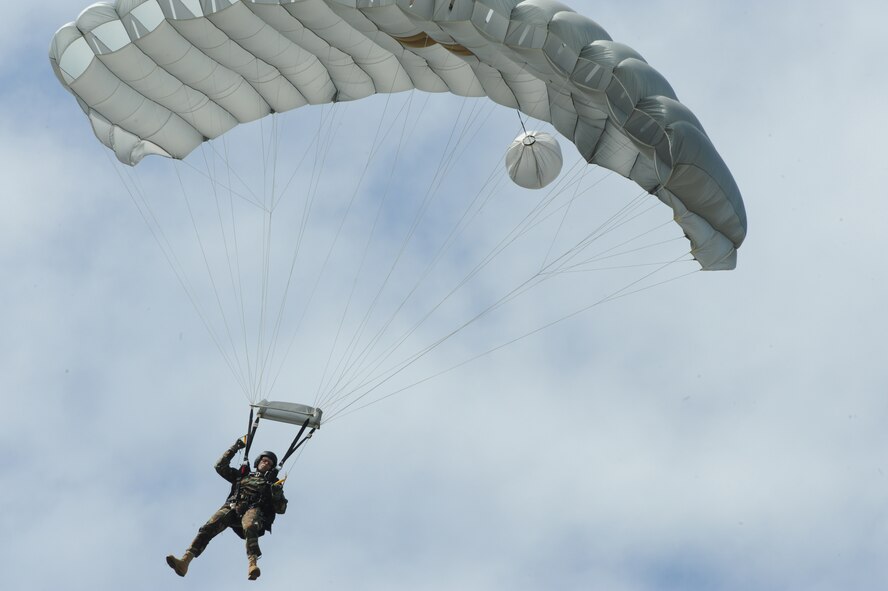 MOODY AIR FORCE BASE, Ga. -- Chief Master Sgt. Brian Douglas, 38th Rescue Squadron chief enlisted manager, descends toward the drop zone using a special operations free-fall parachute during a jump here Oct. 29. This parachute is designed for high-altitude drop zone capabilities. (U.S. Air Force photo by Staff Sgt. Elizabeth Rissmiller)