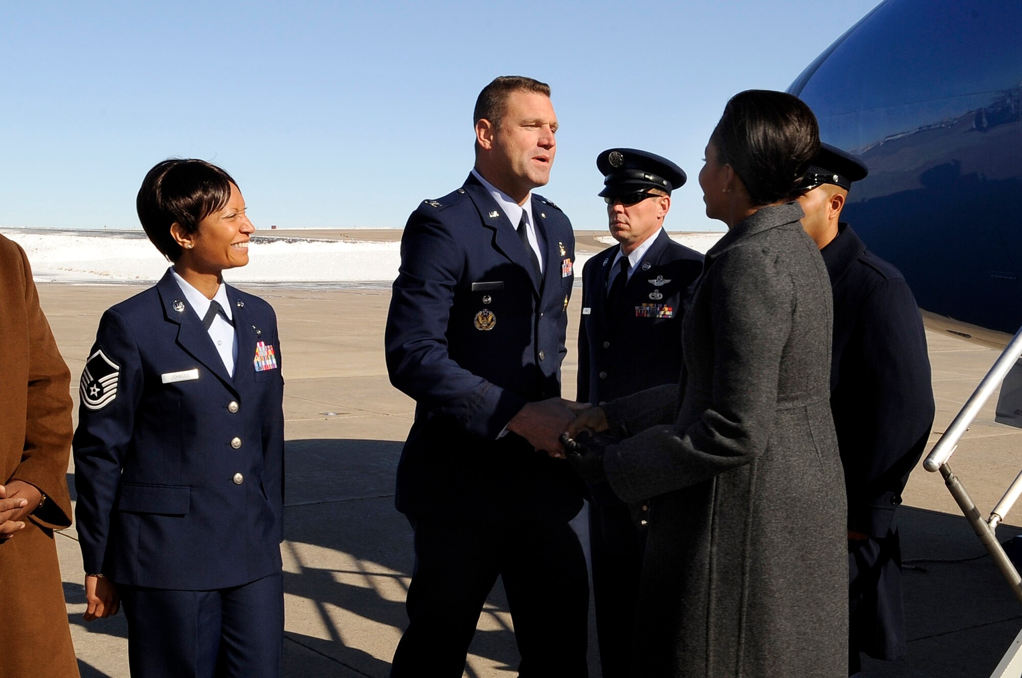 BUCKLEY AIR FORCE BASE, Colo. -- First Lady Michelle Obama is greeted by Col. Trent Pickering, 460th Space Wing vice commander, as she arrives at Buckley Air Force Base, Nov. 16. (U.S. Air Force photo by Staff Sgt. Steve Czyz)
