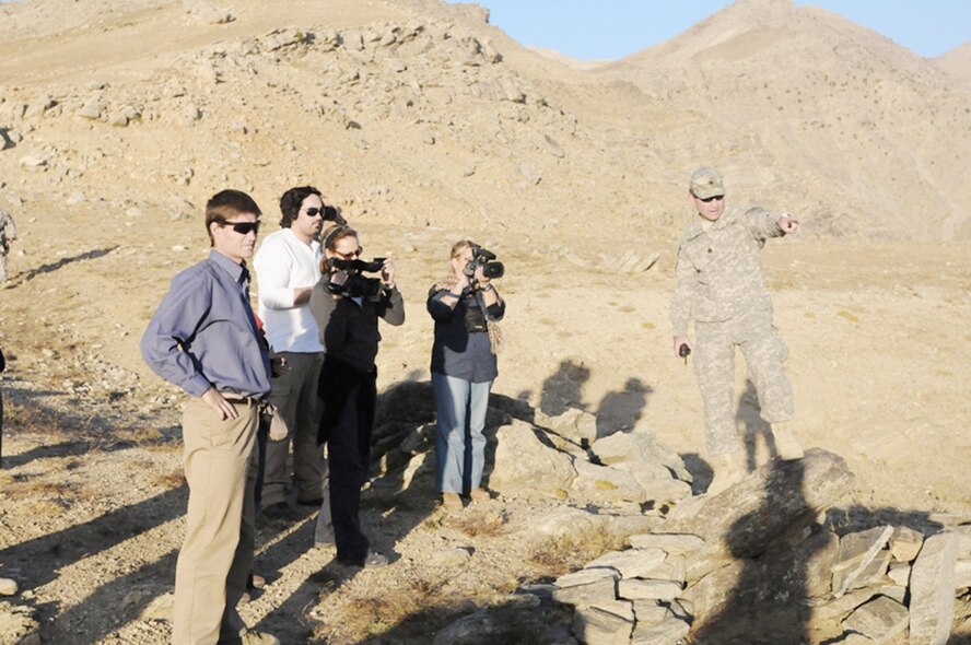 Lt. Col. Eric Hommel (right) explains the historical significance of the Daraband Pass to several NATO journalists with Jeremy Lewis (left) Oct. 15, 2009, in the Panjshir Province, Afghanistan. The U.S. military presence is vital to providing the resources to maintain security in the valley enabling civilian organizations to spearhead development efforts. Colonel Hommel is the Panjshir Provincial Reconstruction Team commander. Mr. Lewis is the U.S. Aid for International Development representative to the PRT. (U.S. Air Force photo/Capt. John Stamm)