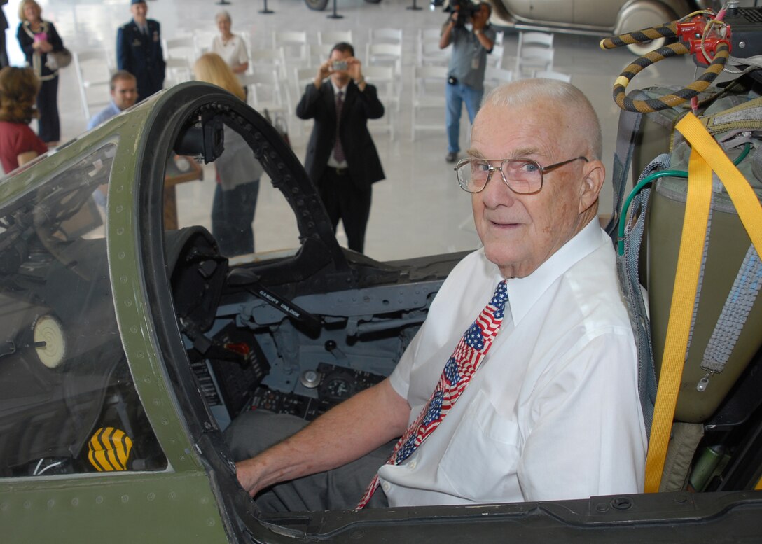 Retired Air Force Col. James Hivner sits in the front seat of an F-4 Phantom Nov. 11 moments after he received his original wedding ring and dog tag during a ceremony at the Cavanaugh Flight Museum in Addison, Texas. The colonel was an F-4C Phantom pilot during the vietnam war and was shot down Oct. 5, 1965, during a bombing mission. His ring and dog tag were confiscated by the North Vietnamese and never returned until 44 years later. (U.S. Air Force photo/Lou Anne Sledge)