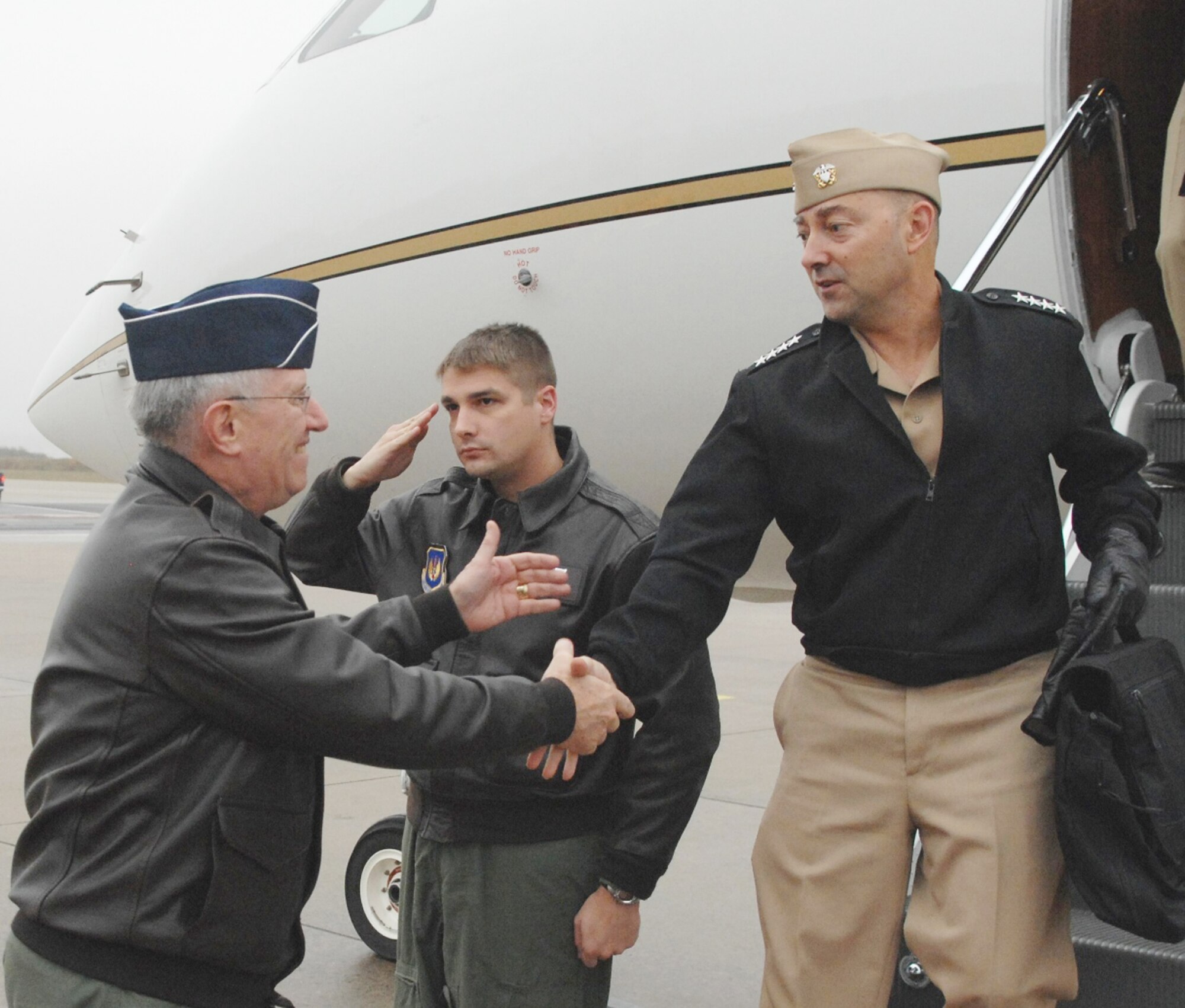 Navy Adm. James Stavridis is greeted by Gen. Roger A. Brady Nov. 10, 2009, at Ramstein Air Base, Germany. Admiral Stavridis, the commander of U.S. European Command and Supreme Allied Commander in Europe, met with General Brady, the commander of U.S. Air Forces in Europe, to discuss USAFE's vital role in accomplishing the EUCOM mission. (U.S. Air Force photo/Master Sgt. Corey Clements)