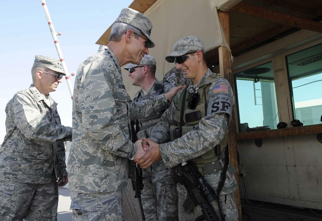 Air Force Chief of Staff Gen. Norton Schwartz meets Airman 1st Class Jeremy Breznai during a tour Nov 13. 2009, of an air base in Southwest Asia. Airman Breznai is a visits 380th Air Expeditionary Wing security forces member. (U.S. Air Force photo) 
