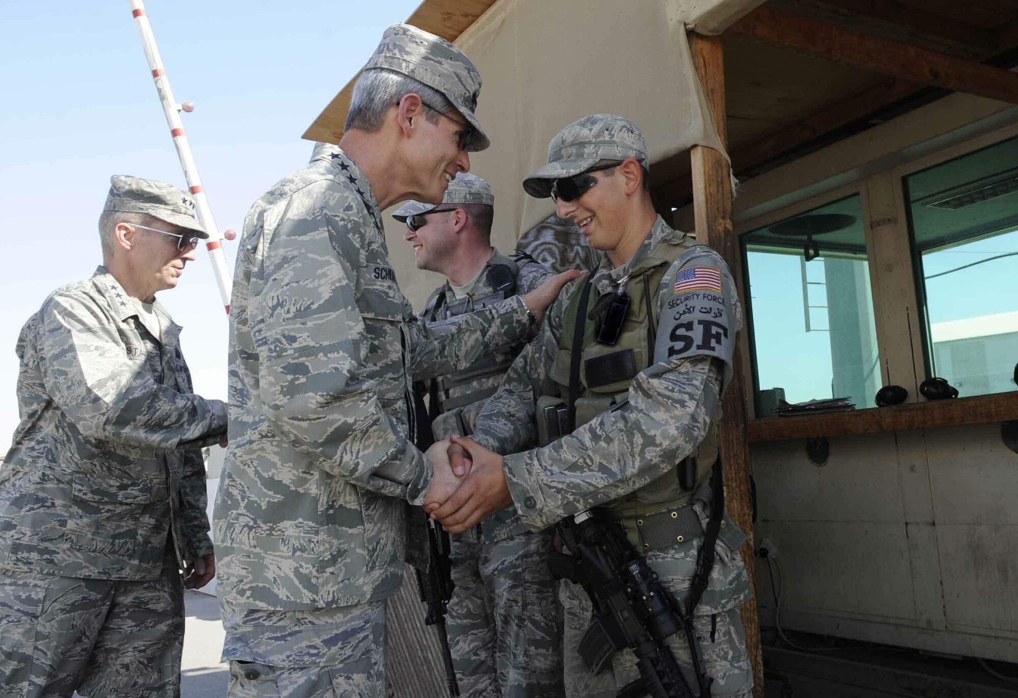 Air Force Chief of Staff Gen. Norton Schwartz meets Airman 1st Class Jeremy Breznai during a tour Nov 13. 2009, of an air base in Southwest Asia. Airman Breznai is a visits 380th Air Expeditionary Wing security forces member. (U.S. Air Force photo) 
