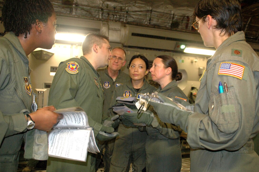 Members of the 439th Aeromedical Evacuation Squadron, Westover ARB, Mass., participate in a joint C-17 training mission with members of the 315th Airlift Wing, Charleston AFB, S.C.  (Air Force photo/Capt. Wayne Capps)