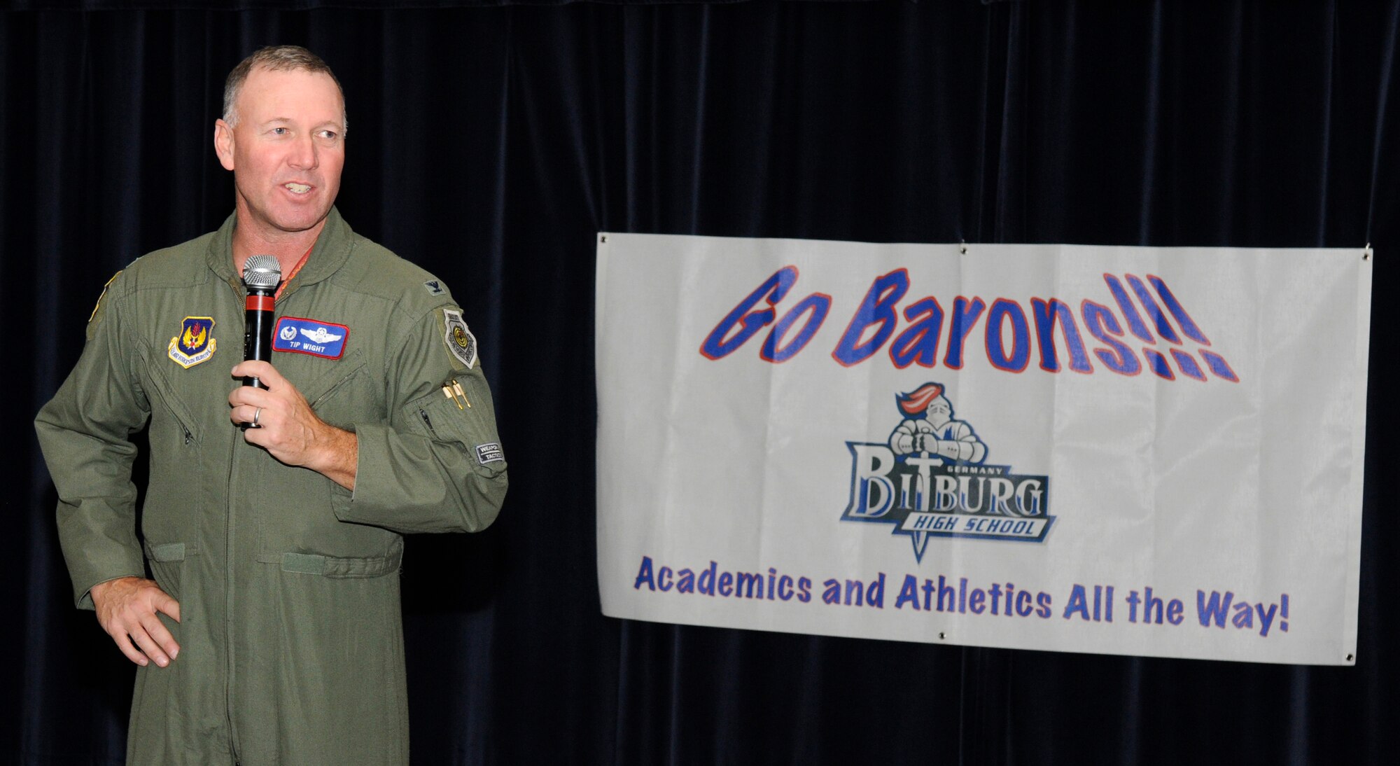 SPANGDAHLEM AIR BASE, Germany – Col. Tip Wight, 52nd Fighter Wing commander, congratulates the Bitburg Barons football team during a celebration dinner Nov. 10. The Bitburg Barons won the Department of Defense Dependents Schools-Europe Division II football championship game against the Ansbach Cougars Nov. 7. The Bitburg Barons defeated the Cougars 19-6 and ended the Cougars’ 31-game winning streak to claim the title as Division II champions. (U.S. Air Force photo/Airman 1st Class Staci Miller)