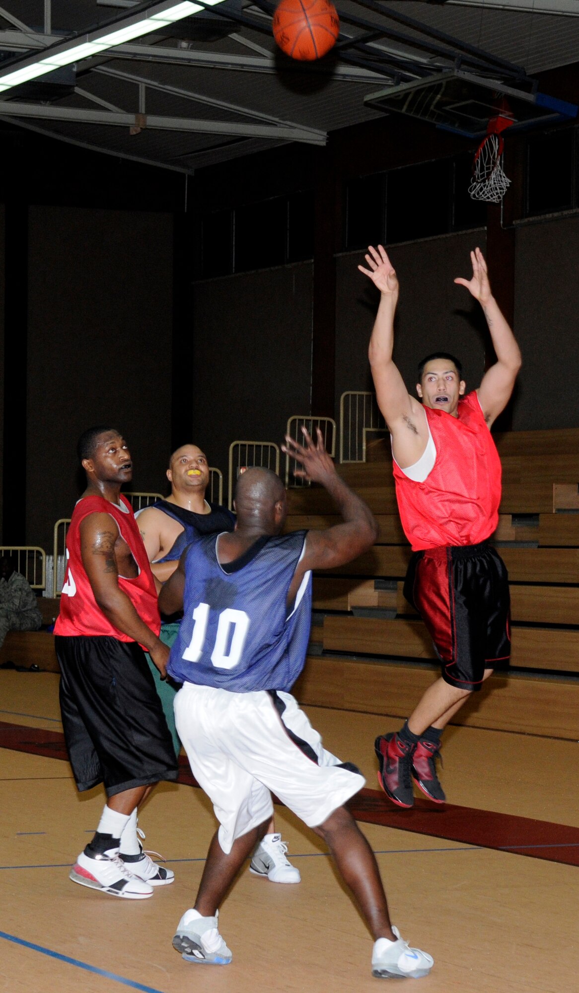 SPANGDAHLEM AIR BASE, Germany – Airmen from the 52nd Force Support Squadron and 52nd Logistics Readiness Squadron compete during the Spangdahlem intramural pre-season basketball tournament Nov 10. The 52nd Communication Squadron won the tournament, with the 52nd Operations Group team coming in second. Regular season begins Dec. 1. (U.S. Air Force photo/Airman 1st Class Staci Miller)
