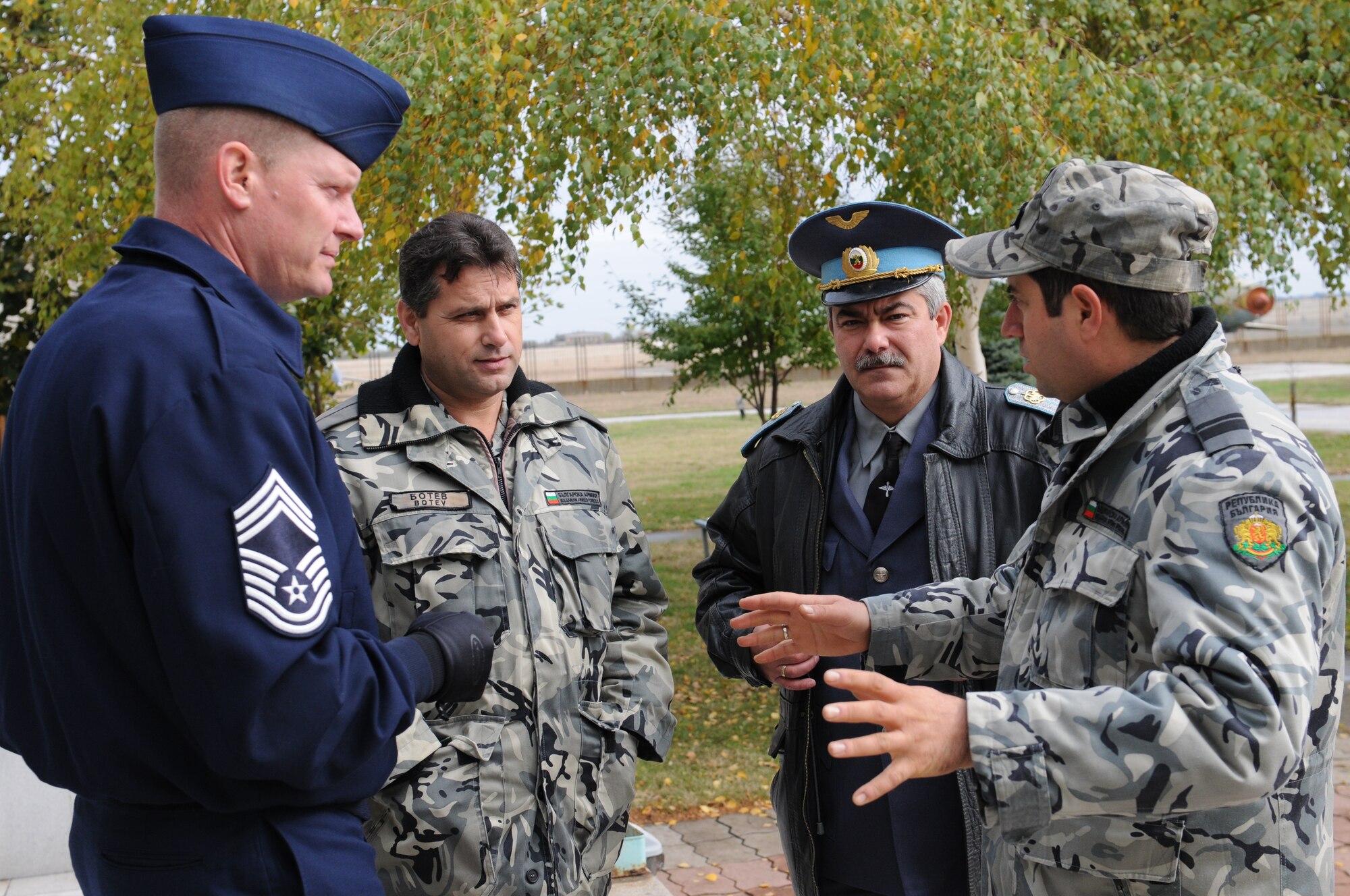 Chief Master Sgt. David Lawrence, Kipling NCO Academy commandant, left, discusses enlisted force development issues with Chief Master Sergeant Kalin Krumov, right, Warrant Officer Ivo Bakardijiva, acting chief master sergeant of the Bulgarian air force, second from right, and Bulgarian Chief Master Sgt. Hristo Botev, command chief for Krumovo Air Force Base, Bulgaria. (U.S. Air Force photo by MSgt Timothy Barfield)