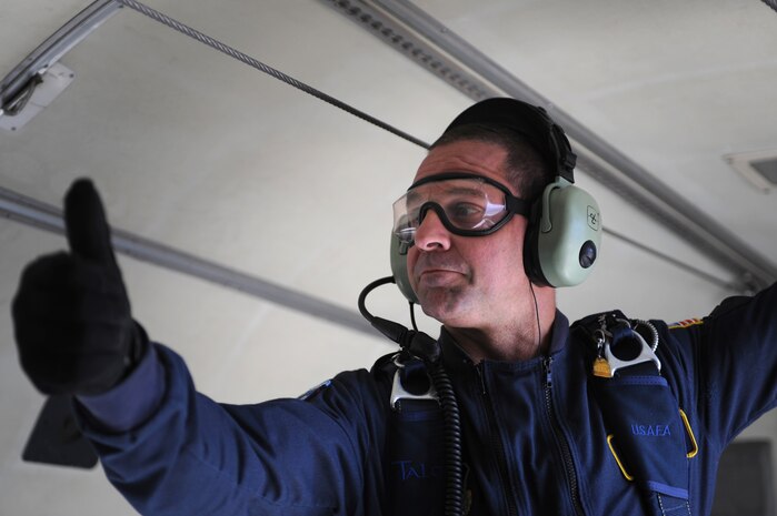 NELLIS AIR FORCE BASE, Nev.-- Master Sgt. David Fremin from the U.S. Air Force Academy Parachute Team "Wings of Blue" gives the combined cadet/instructor demonstration team a thumbs up before a jump at the Aviation Nation Nellis Open House Nov. 15. The open house is an opportunity for the Las Vegas community to view aerial demonstrations and static displays of various aircraft from the military. The open house also acts as the final air show of the year for the U.S. Air Force Air Demonstration Squadron Thunderbirds.
(U.S. Air Force photo by Tech. Sgt. Michael R. Holzworth)

