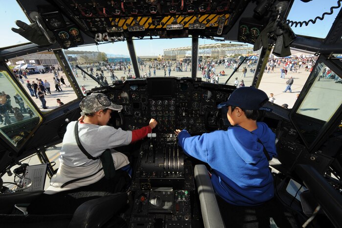 NELLIS AIR FORCE BASE, Nev.-- (L-R) Kentaro Slack, age 9 and Yuta Nakamura, age 8, get a first hand look at a MC-130 Talon?s cockpit during the 2009 Aviation Nation Nellis Open House Nov 14. The Nellis Air Force Base Open House is an opportunity for the Las Vegas community to view aerial demonstrations and static displays of various aircraft from the military. The open house also acts as the final air show of the year for the U.S. Air Force Aerial Demonstration Squadron Thunderbirds.
(U.S. Air Force photo by Master Sgt. Kevin J. Gruenwald)
