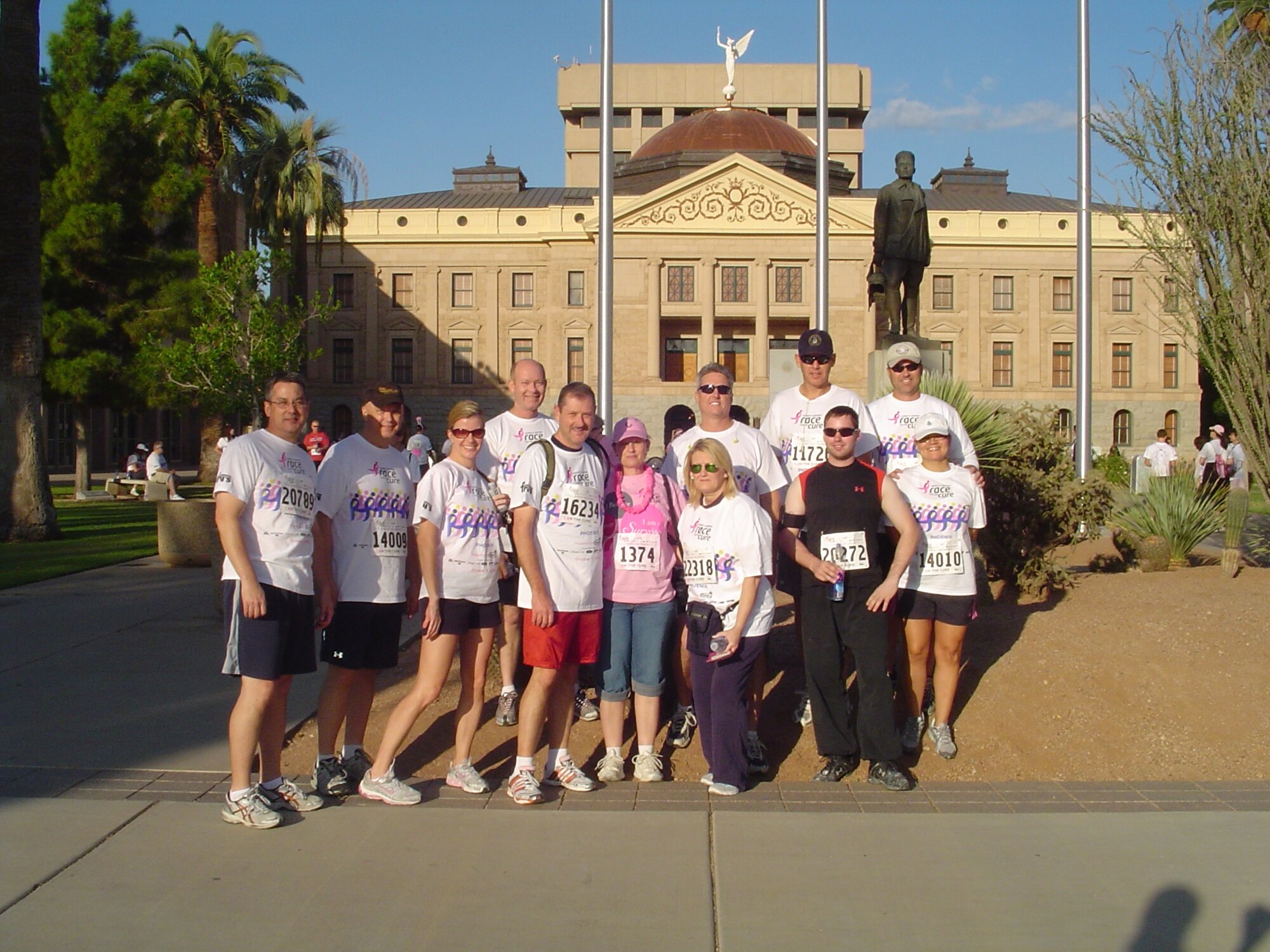 Members of the 16st Air Refueling Wing gather before the run in the Susan G. Komen for the Cure.