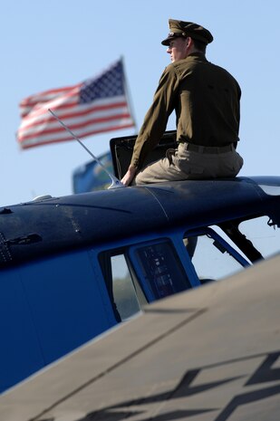 NELLIS AIR FORCE BASE, Nev.-- Ben Johnson, a Nellis Open House volunteer, dresses in vintage U.S.Army Air Corps clothing and sits a top a PV-2 Harpoon used during World War II Nov. 14.  The PV-2 Harpoon was a static display at the 2009 Aviation Nation Nellis Open House. The open house is an opportunity for the Las Vegas community to view aerial demonstrations and static displays of various aircraft from the military. The open house also acts as the final air show of the year for the U.S. Air Force Aerial Demonstration Team Thunderbirds.
(U.S. Air Force photo by Tech. Sgt. Michael R. Holzworth)