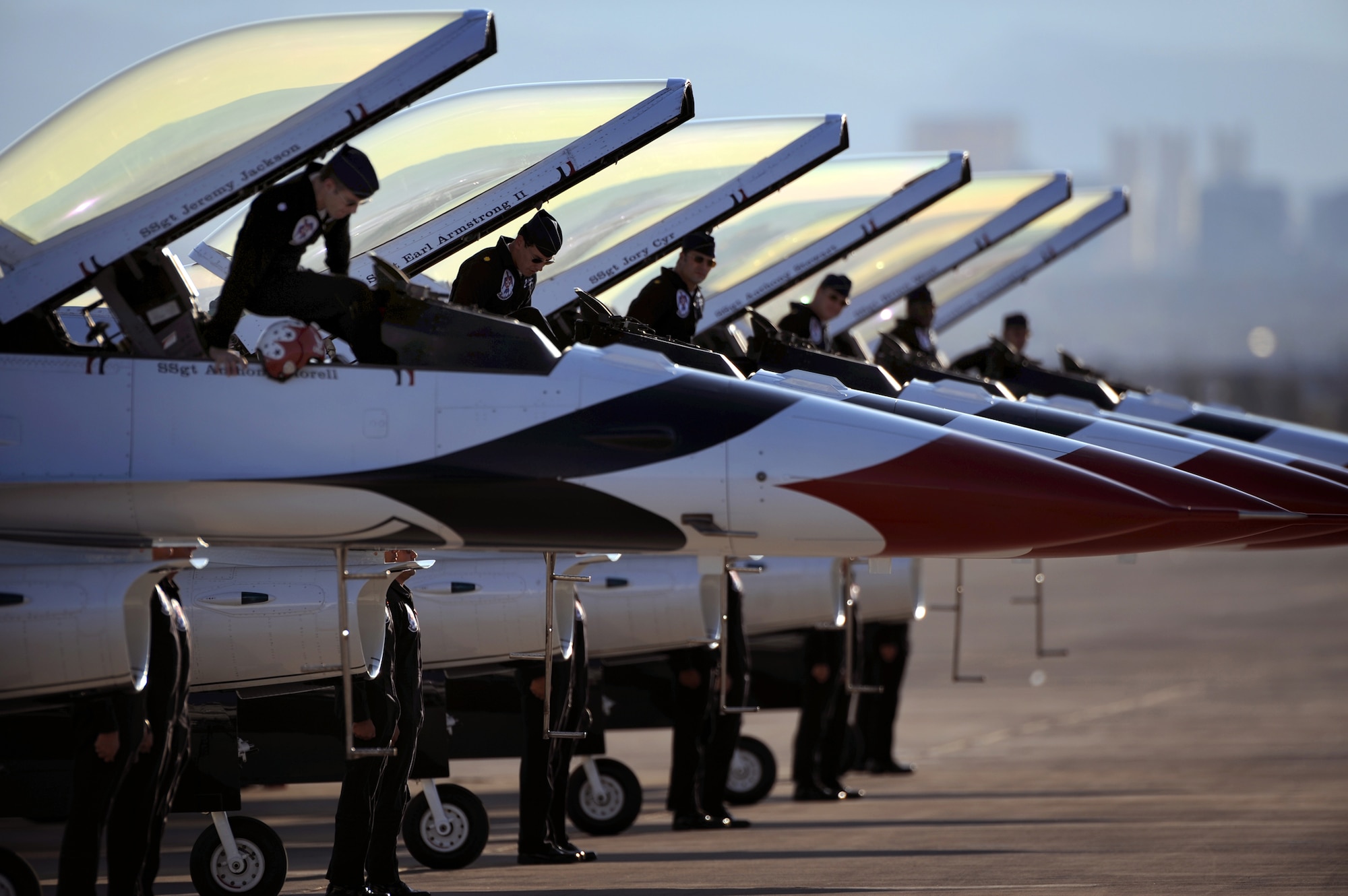 NELLIS AIR FORCE BASE, Nev.-- The U.S. Air Force Air Demonstration Team Thunderbirds pilots exit their F-16s after completing the final performance of the season during the 2009 Aviation Nation Nellis Open House. The open house is an opportunity for the Las Vegas community to view aerial demonstrations and static displays of various aircraft from the military. The open house also acts as the final air show of the year for the Thunderbirds. 
(U.S. Air Force photo by Tech. Sgt. Michael R. Holzworth)