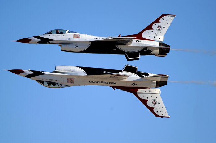NELLIS AIR FORCE BASE, Nev. - Two U.S. Air Force Air Demonstration Team Thunderbirds F-16s perform the calypso pass during the 2009 Aviation Nation Nellis Open House. The open house is an opportunity for the Las Vegas community to view aerial demonstrations and static displays of various aircraft from the military. The open house also acts as the final air show of the year for the Thunderbirds. (U.S. Air Force photo by Tech. Sgt. Michael R. Holzworth)