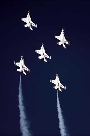NELLIS AIR FORCE BASE, Nev.-- The U.S. Air Force Air Demonstration Team Thunderbirds F-16s perform a five ship formation during the 2009 Aviation Nation Nellis Open House Nov. 14. The open house is an opportunity for the Las Vegas community to view aerial demonstrations and static displays of various aircraft from the military. The open house also acts as the final air show of the year for the Thunderbirds. (U.S. Air Force photo by Tech. Sgt. Michael R. Holzworth)
