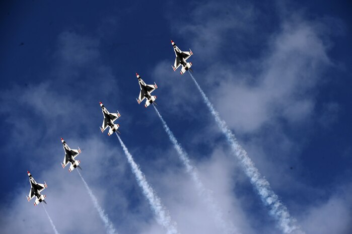 NELLIS AIR FORCE BASE, Nev.-- The United States Air Force Air Demonstration Squadron Thunderbirds pull into the line-break loop maneuver over Nellis during the 2009 Aviation Nation Nellis Open House Nov. 13. The Nellis Open House is an opportunity for the Las Vegas community to view aerial demonstrations and static displays of various aircraft from the military. The open house also acts as the final air show of the year for the Thunderbirds. (U.S. Air Force photo by Master Sgt. Kevin J. Gruenwald)