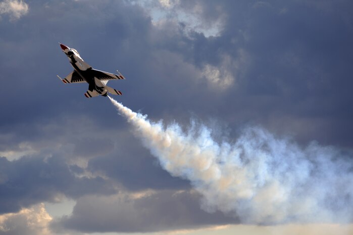 NELLIS AIR FORCE BASE, Nev.-- A U.S. Air Force Air Demonstration Team Thunderbird F-16 performs a high angle of attack during the 2009 Aviation Nation Nellis Open House. The open house is an opportunity for the Las Vegas community to view aerial demonstrations and static displays of various aircraft from the military. The open house also acts as the final air show of the year for the Thunderbirds. (U.S. Air Force photo by Tech. Sgt. Michael R. Holzworth)