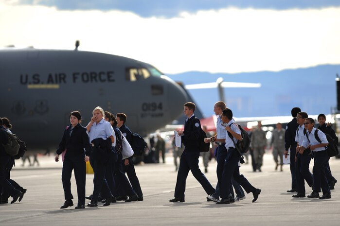 NELLIS AIR FORCE BASE, Nev.-- Liberty High School Air Force Junior Reserve Officer Training Corps look at aircraft on the Nellis flight line during the 2009 Aviation Nation Nellis Open House Nov. 13. The open house is an opportunity for the Las Vegas community to view aerial demonstrations and static displays of various aircraft from the military. The open house also acts as the final air show of the year for the U.S. Air Force Air Demonstration Team Thunderbirds. (U.S. Air Force photo by Tech. Sgt. Michael R. Holzworth)
