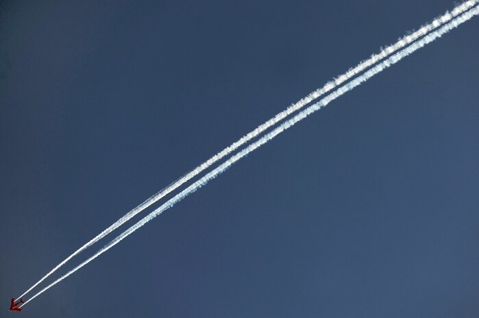 NELLIS AIR FORCE BASE, Nev.-- Bill Reesman, an open house pilot, streaks across the southern Nevada sky in a Mig-17 during the 2009 Aviation Nation Nellis Open House Nov. 13. The open house is an opportunity for the Las Vegas community to view aerial demonstrations and static displays of various aircraft from the military. The open house also acts as the final air show of the year for the U.S. Air Force Air Demonstration Team Thunderbirds. (U.S. Air Force photo by Tech. Sgt. Michael R. Holzworth)