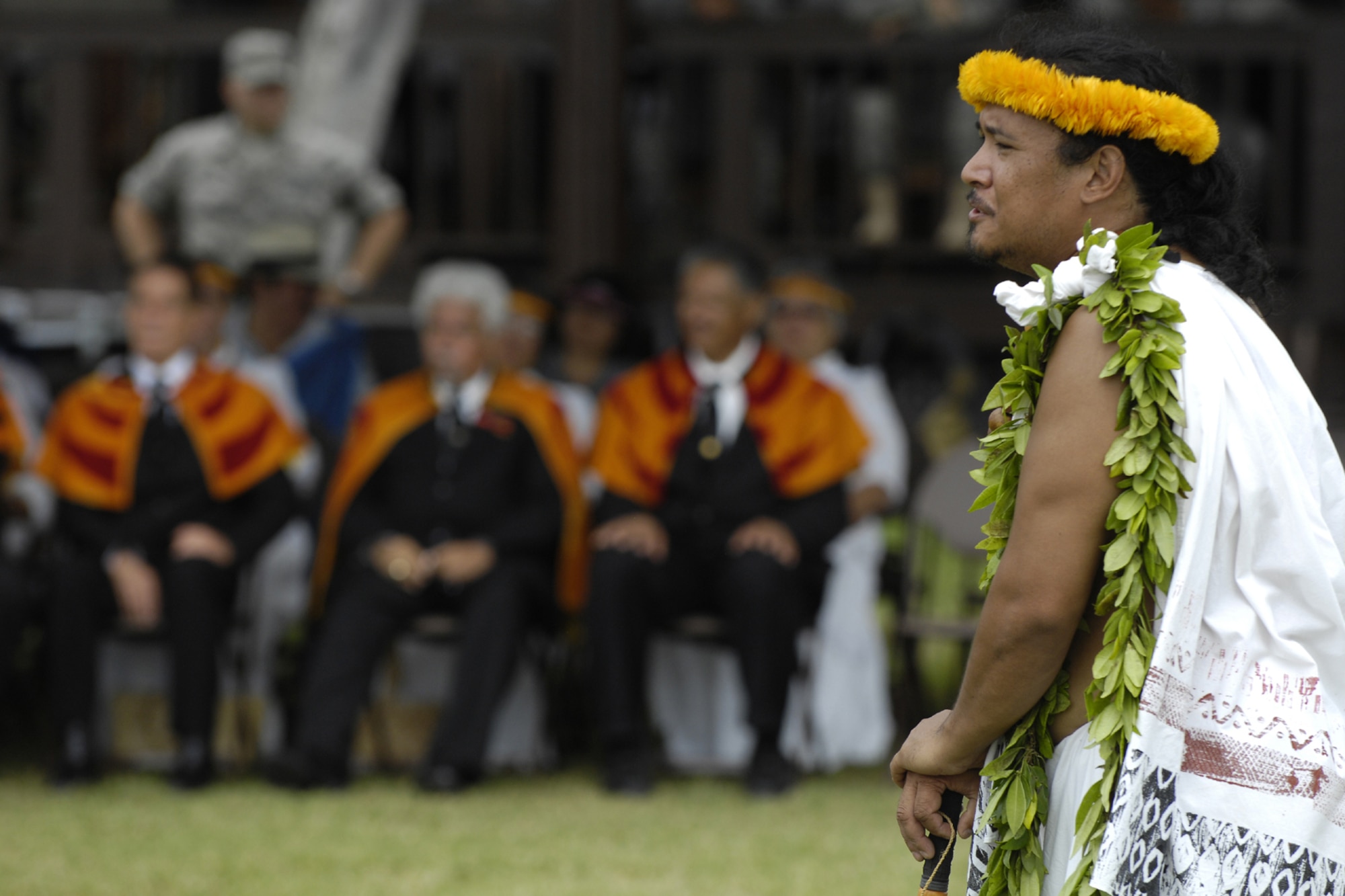 HICKAM AIR FORCE BASE, Hawaii - Braven Canibog, Makahiki protocol officer, chants an oli, or a blessings in the native Hawaiian language at the beginning of the 7th Annual Kapuaikaula (Hickam) Makahiki (Thanksgiving) festival Nov. 14. Local Hawaiian and Hickam officials gathered at Hickam Harbor for the ancient ceremony and festival. The festival involved a ceremonial arrival in canoes, spiritual offerings, five skills competitions and a feast to end the day. According to history texts, the Makahiki was started to honor Lono, the Hawaiian guardian of agriculture, rain, health and peace. The offerings to Lono during the Makahiki were taken to the burial site. (DoD photo by U.S.  Air Force Tech Sgt. Cohen A. Young)