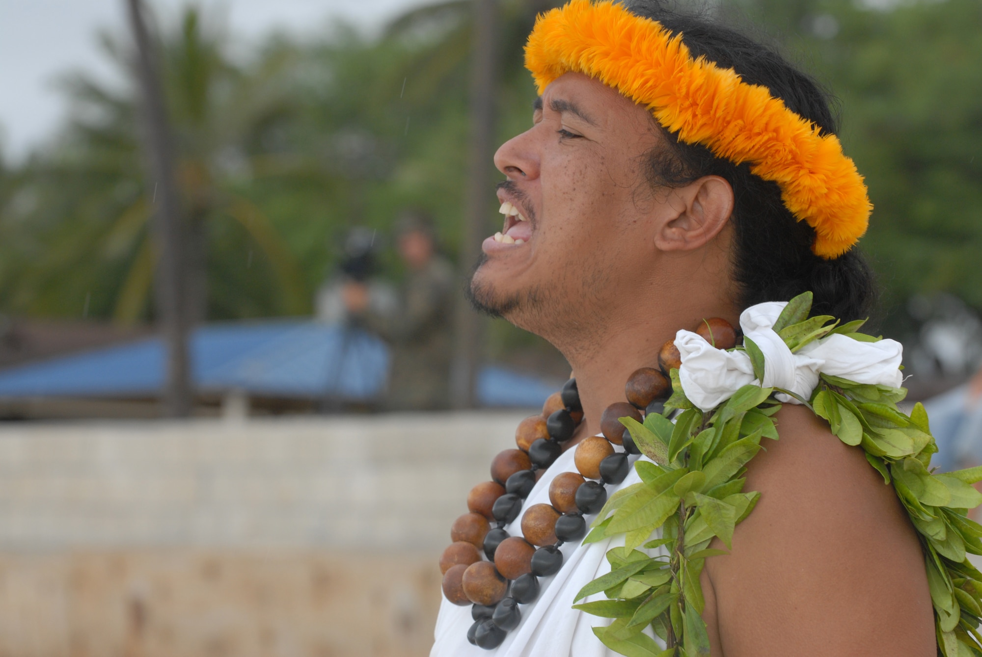 HICKAM AIR FORCE BASE, Hawaii - Braven Canibog, Makahiki protocol officer, announces the arrival of Lono in the native Hawaiian language during the opening ceremonies for the 7th Annual Kapuaikaula (Hickam) Makahiki (Thanksgiving) festival. Local Hawaiian and Hickam officials gathered at Hickam Harbor on Nov. 14 for the Makahiki festival. The festival involved a ceremonial arrival in canoes, spiritual offerings, five skills competitions and a feast to end the day. According to history texts, the Makahiki was started to honor Lono, the Hawaiian guardian of agriculture, rain, health and peace. (U.S. Air Force photo/Senior Airman Gustavo Gonzalez)